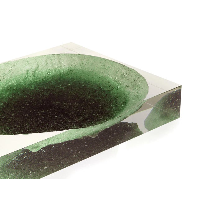 Glacoja is a unique centrepiece with a vivid colored heart, sculpted through technology and craftmanship from a block of...