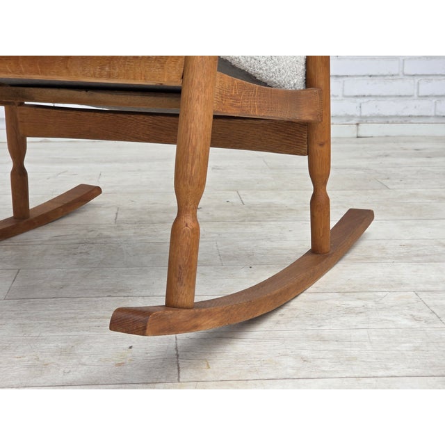 1970s, Scandinavian design. Completely renovated-reupholstered high-backed rocking chair. Quality white furniture fabric,...