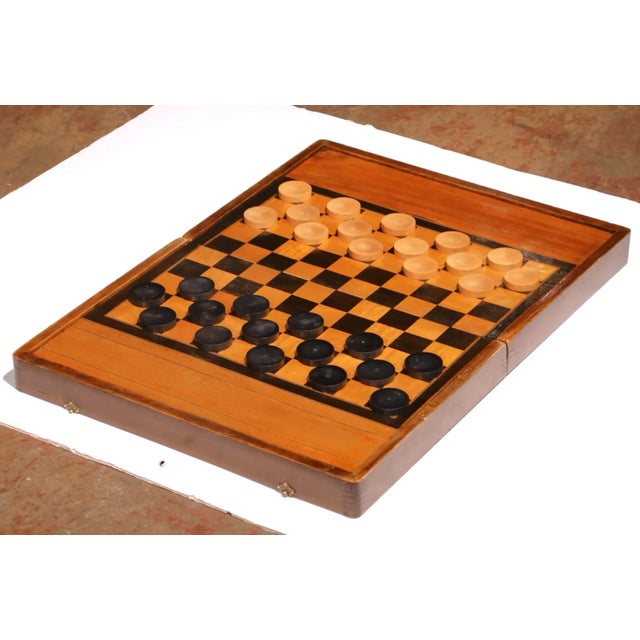 Entertain guests or elevate a study or game room with this elegant antique game box. Crafted in France circa 1890, the...