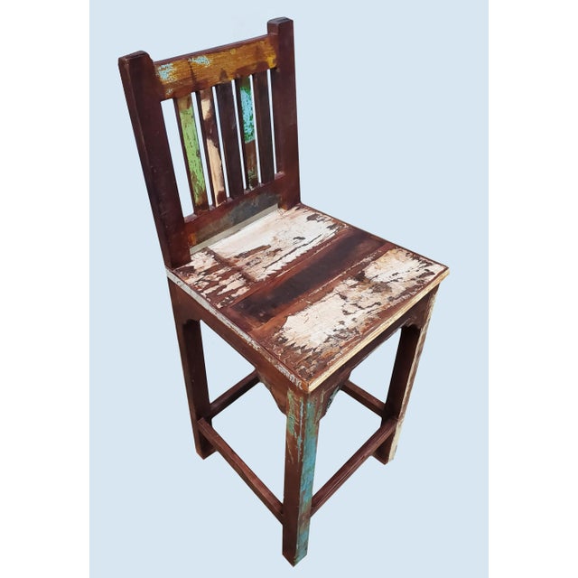 High top Indonesian wood dining table set. Very sturdy and durable dining table, and comes with 4 matching dining chairs....