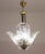 Elegant Murano chandelier with 3 murano glass leaves in iridiscent colour. The chain has been replaced, all glass is...