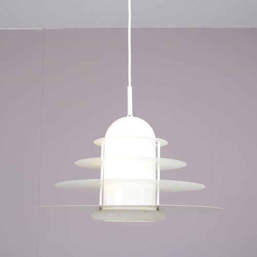 A beautiful hanging lamp, model “b1017”, designed by andré rotte and manufactured by raak in the netherlands around 1980....