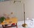 Modernist articulate adjustable height and angle floor lamp, made of golden chromed metal. Estimated that it was designed...