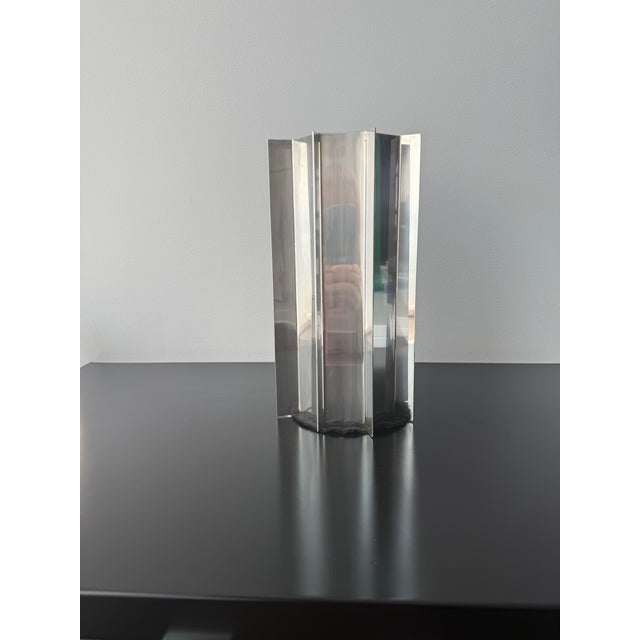 Sterling silver octagonal shaped vase designed by Carlo Scarpa for Cleto Munari and characterized by the radial rays in...