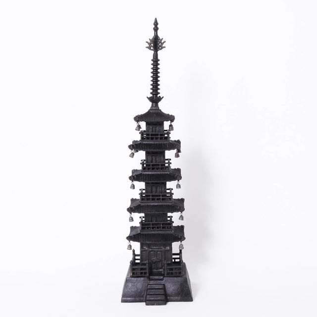 Enchanting pair of Japanese pagodas crafted in iron with classic finials or sorin at the tops on five floors with hanging...