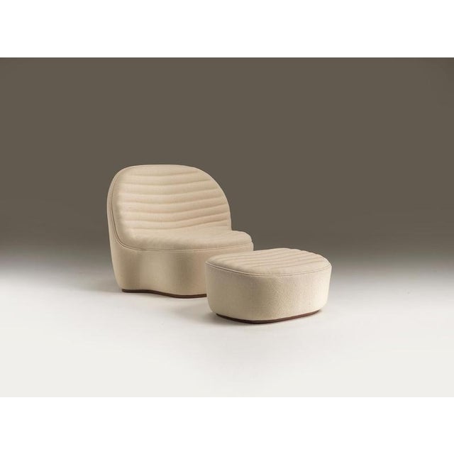 Emma Lounge Chair by Haymann Editions Dimensions: D 83 x W 120 x H 95 cm. Materials: Upholstery. Like a symphony of curves...