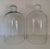 A pair of vintage, clear glass cloches or domes. Thanks to their height they can not only be used to grow plants...