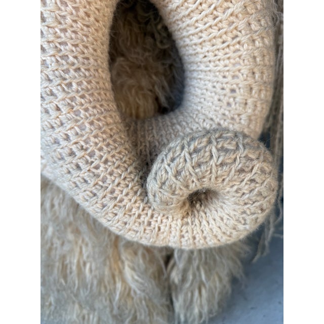 An extraordinary blend of folk art, sculpture, and functional design, this whimsical Bighorn Ram by Edna Cataldo...