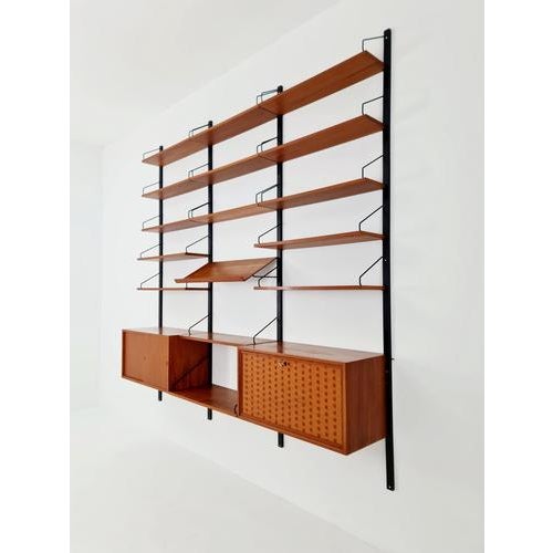 Large mid-century Danish teak wall unit with two cabinets by Poul Cadovius for Cado, Denmark, 1960s. Danish design by Poul...