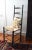 Nice and unique English oak (stained dark brown) ladder back chair with a newly re-thrushed seat and gorgeous faux bamboo...