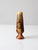 This mid-century studio pottery bud vase features a tall tapered form accented by a richly layered lava glaze in shades of...