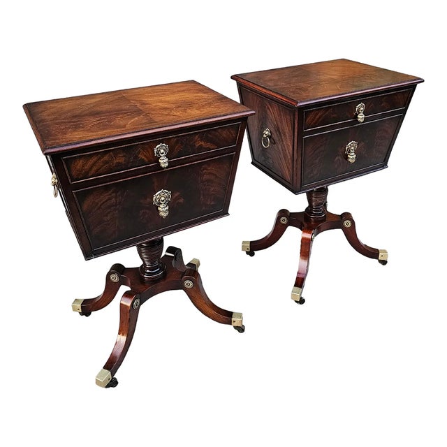 This delightful Pair of Vintage Flame Mahogany Regency Style Teapoy-Shaped Side Table Cabinets features rich mahogany...