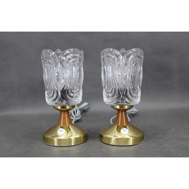 A vintage pair of mid-century table lamps manufactured by lidokov in 1970s czechoslovakia. These lamps feature thick,...