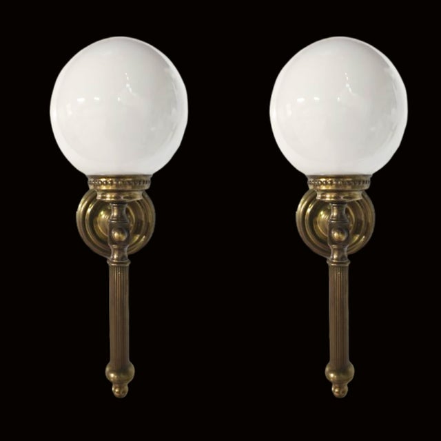 Empire style wall sconces, inspired by the timeless elegance of the 1940s. These sconces perfectly capture the essence of...