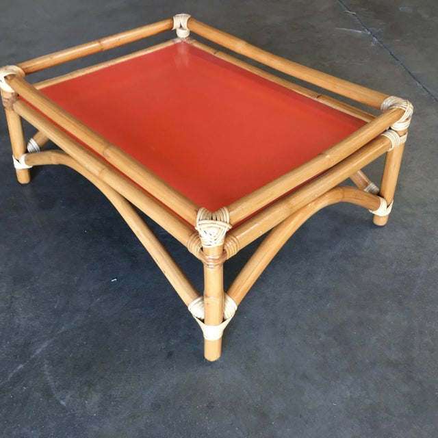 Restored arched rattan ottoman stool with fenced top. Restored to new for you. All rattan, bamboo and wicker furniture has...