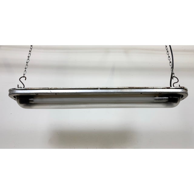 This industrial tube light was made in former Czechoslovakia during the 1970s. These lights were used in Czechoslovak...