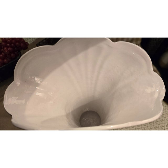 Pretty elegant white vase with wide flared opening. Unmark Hull style vase. 11 inches tall 9 inches wide 5 inches deep 5...