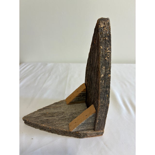 Authentic vintage wooden corner shelf bracket crafted from aged, weathered wood. Triangular primitive design ideal for...