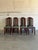 This set of eight high back dining chairs features a sleek vertical profile and supportive frame. The tall backs...