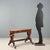 Mid-19th century walnut side table, originally part of a psyche, featuring a drawer with a finely carved front in the...