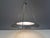 Postmodern ufo or flying saucer hanging lamp that gives diffused light upwards and downwards. A real eye-catcher even...