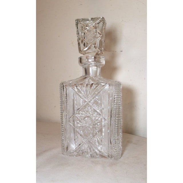 Up for sale is a high quality vintage American brilliant cut clear crystal decanter. It's done with very ornate wheel cut...