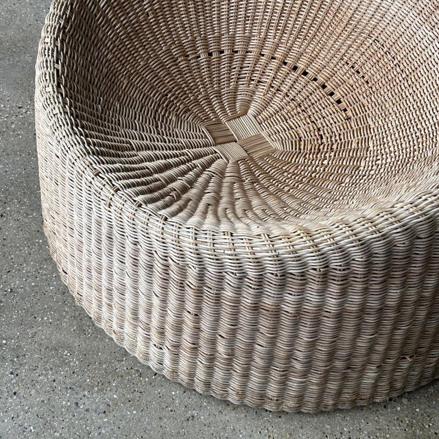 c. 1960s. Wicker construction with bamboo frame. Rare and hard to find. This piece is attributed to the mentioned...