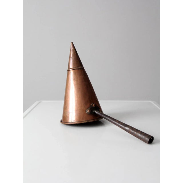 Antique copper ale muller. This hearth vessel was traditionally used to warm spiced ales, cider, or wine by placing it...