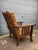 A late 1800s quarter sawn oak Morris recliner with a striking and unique paw arm and claw foot design. A nicely patinated...