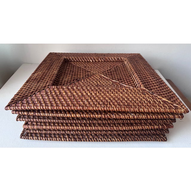 This wonderful set of Brown woven rattan 13" square charge/placemats are perfect to use indoors or for outside as well....