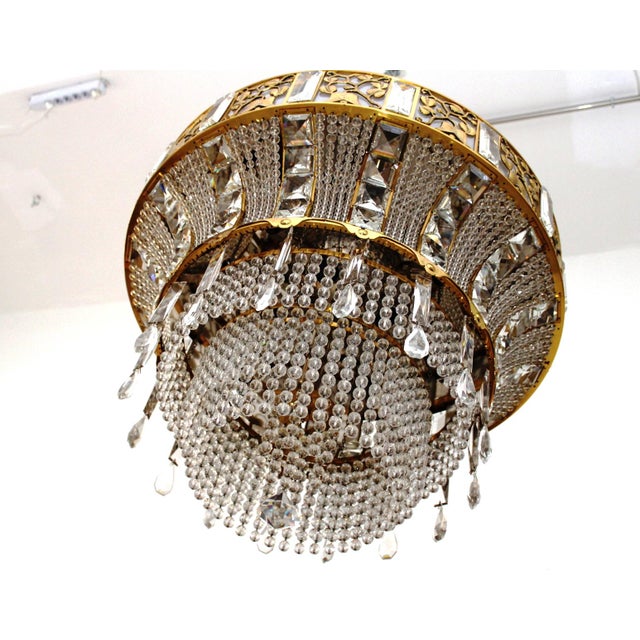 Huge crystal chandelier, designed by Josef Hoffmann for the art exhibition in Cologne, 1914. This example was manufactured...