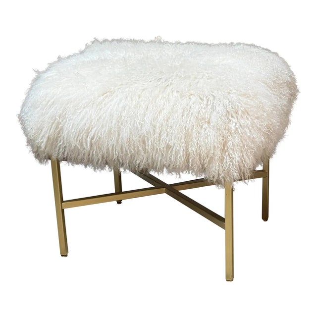 Design Plus Gallery presents a Tibetan Lambskin Ottoman from Outpost Original. Upholstered in white Tibetan lambskin, this...