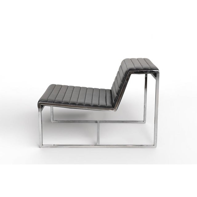 Atlanta Lounge Chair realized by Giuseppe Bavuso for Alivar. Aluminium structure and padded black leather. Excellent...