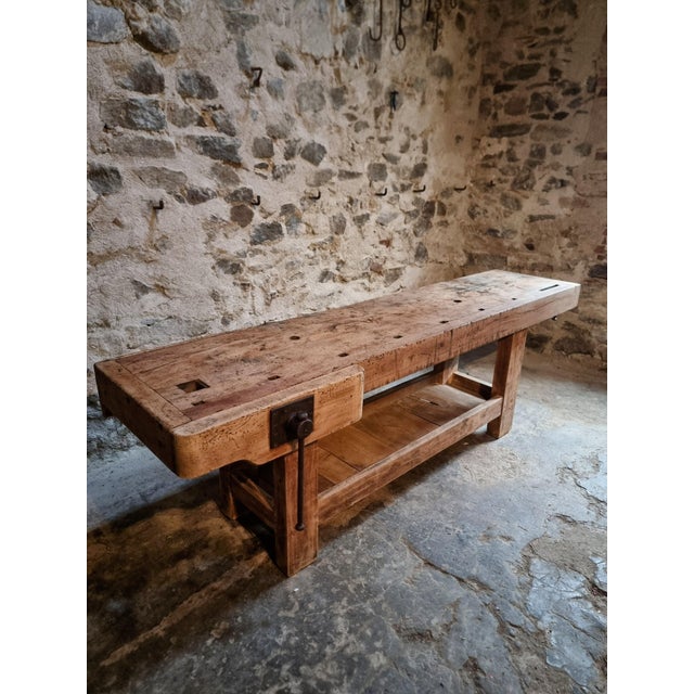 This antique French workbench, crafted from solid beechwood, originates from a workshop in Vichy, France and dates to the...