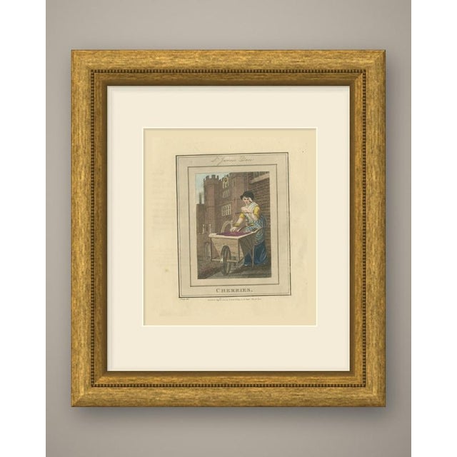 An original antique hand colored copper engraving of a london street seller, lettered "cherries." below the image and "st....