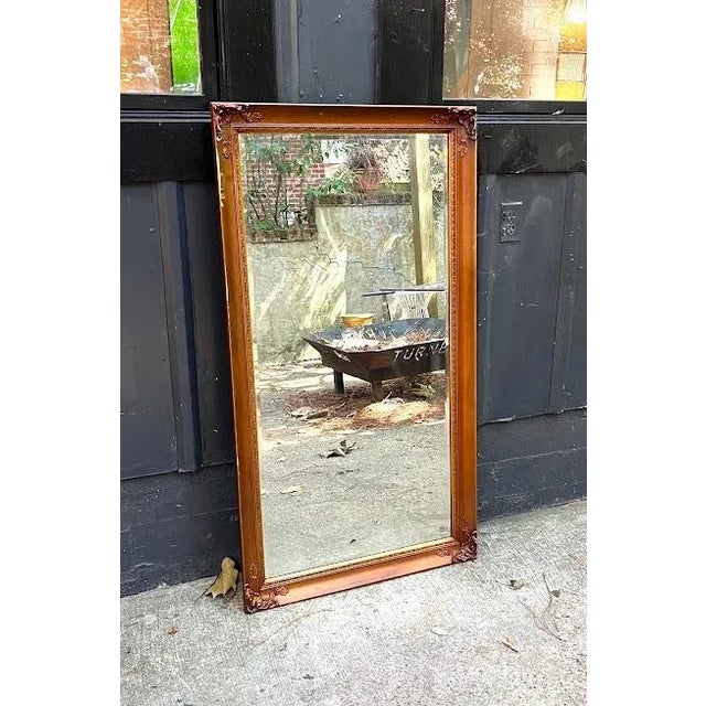 1950s-60s large rectangular full-length gold-frame wall or floor mirror. A couple of small scuffed areas on frame as...