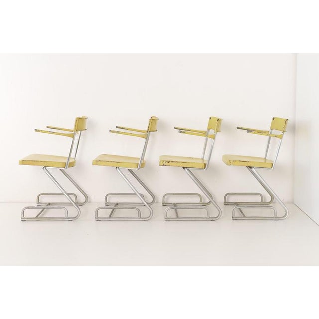 Stacking Chairs Designer: Factory Design Year: around 1940 Manufacturer: unknown swiss steel-furniture manufacturer...