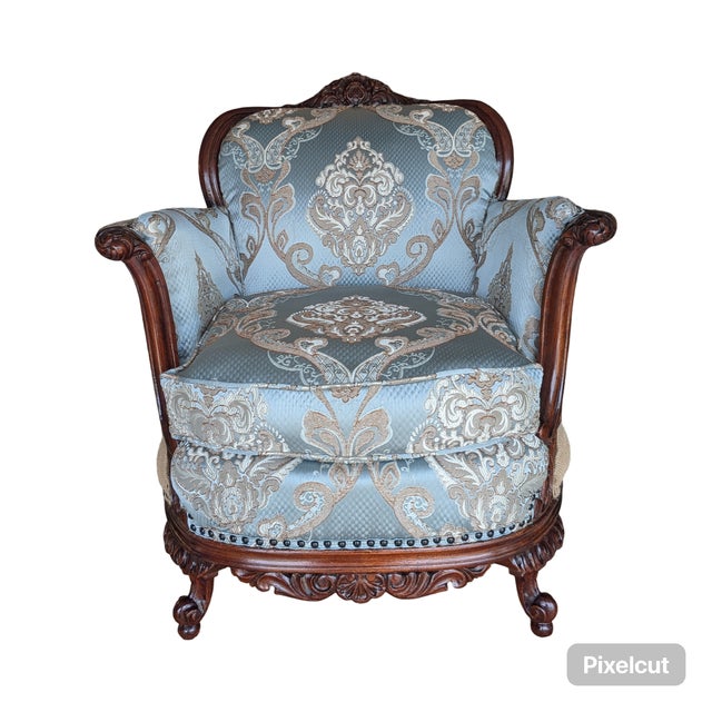 vintage Louis XVI style accent armchair refined in a deconstructed style with a coil spring back and features a...