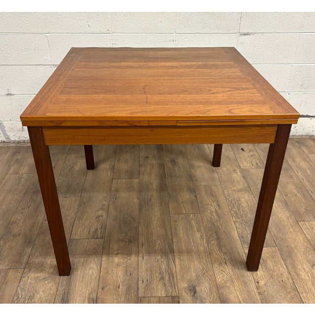This is a gorgeous vintage Mid Century Modern MCM teak draw leaf expandable or extendable dining table. Made in Denmark by...