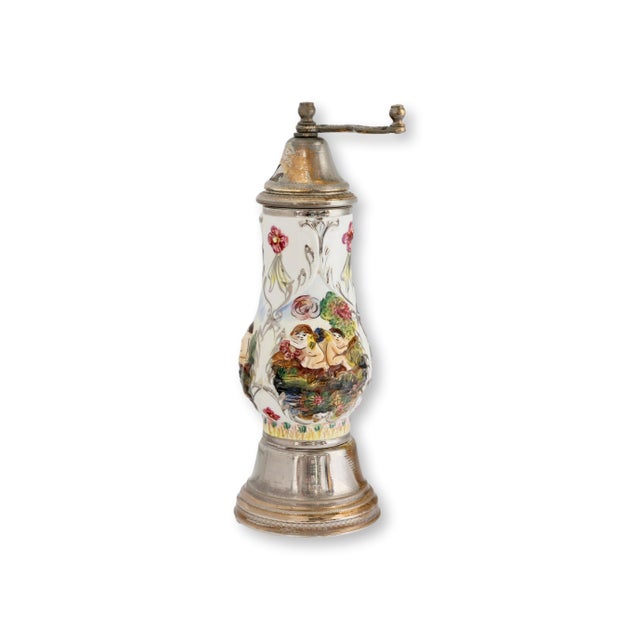Mid 20th century Italian Capodimonte figural pepper grinder featuring hand-painted porcelain decoration with romantic...