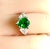 Introducing our exquisite GIA Certified Colombian Pear Emerald Ring, a true testament to timeless elegance and...