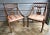 A Pair of English Regency mahogany frame dining chairs, early 19th century. Features exquisite carved back-splats in...