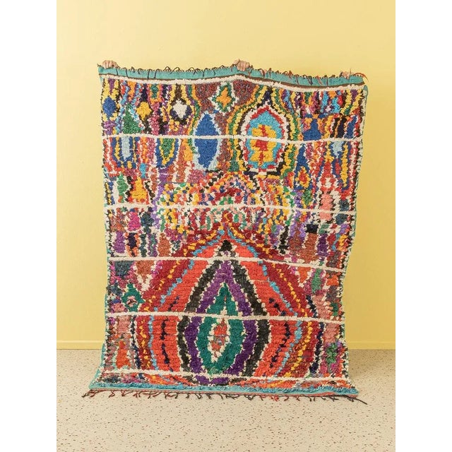 This Boucherouite is a vintage Berber rug made of 100% high quality virgin wool, soft and cozy. Our Berber rugs are hand-...
