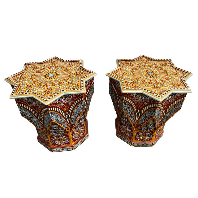 Beautiful pair of hand painted Moroccan star shaped tables. Has nice geometric depth and vivid colors. Great addition to...