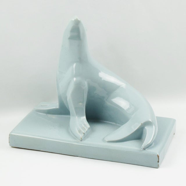 This stunning French Art Deco crackle-glazed Cubist ceramic sculpture is extremely rare, both for its color and model. The...