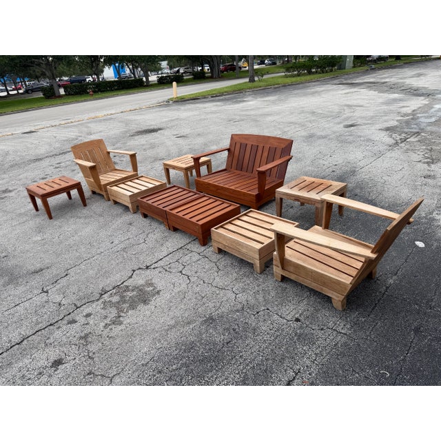 Bring timeless Arts & Crafts elegance to your outdoor oasis with this rare, highly collectible 8-piece "Mission Teak" deep...