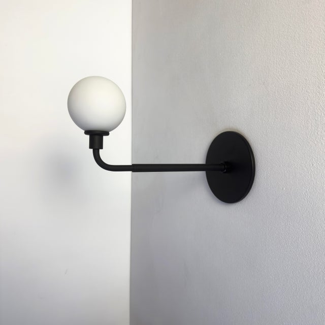 This listing is for 2x Factory 2nds of the Bent Arm Sconce in black manufactured by Research.Lighting. The price is for...