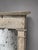 An eighteenth-century Swedish wall mirror in carved and painted wood, distinguished by a compact architectural form and a...