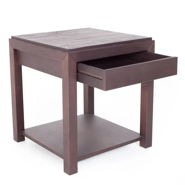 Bedside table with one drawer and a low shelf in Canaletto walnut. The bedside table is in excellent condition. Please...