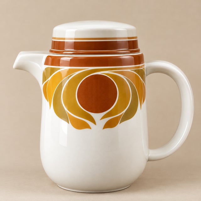 A striking vintage Rosenthal Studio-Line porcelain coffee set, made in Germany, featuring a bold geometric design in warm...